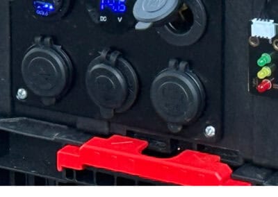 Power outlet connections and digital voltage display on a wildfire sprinkler system mounted in Central Oregon.