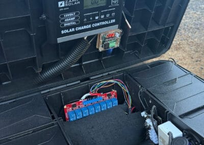 Solar wildfire sprinkler system control panel with ESP32/ESP8266 controllers, connected to ground and roof sprinklers, located in Bend, Oregon, designed for remote monitoring and automated wildfire prevention by Wildfire Watchdog.