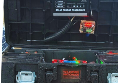 12V solar charge controller with digital display monitoring system voltage levels.